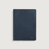 Close-up of premium genuine blue leather texture and fine stitching