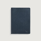 Close-up of premium genuine blue leather texture and fine stitching