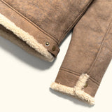 Side profile of men's shearling collar leather bomber jacket