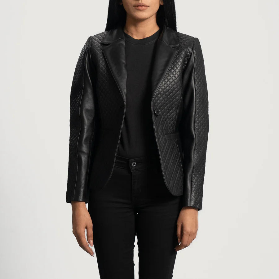 Side profile of women's tailored black diamond quilted leather blazer