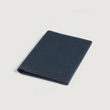 Back view of men's blue leather passport travel wallet