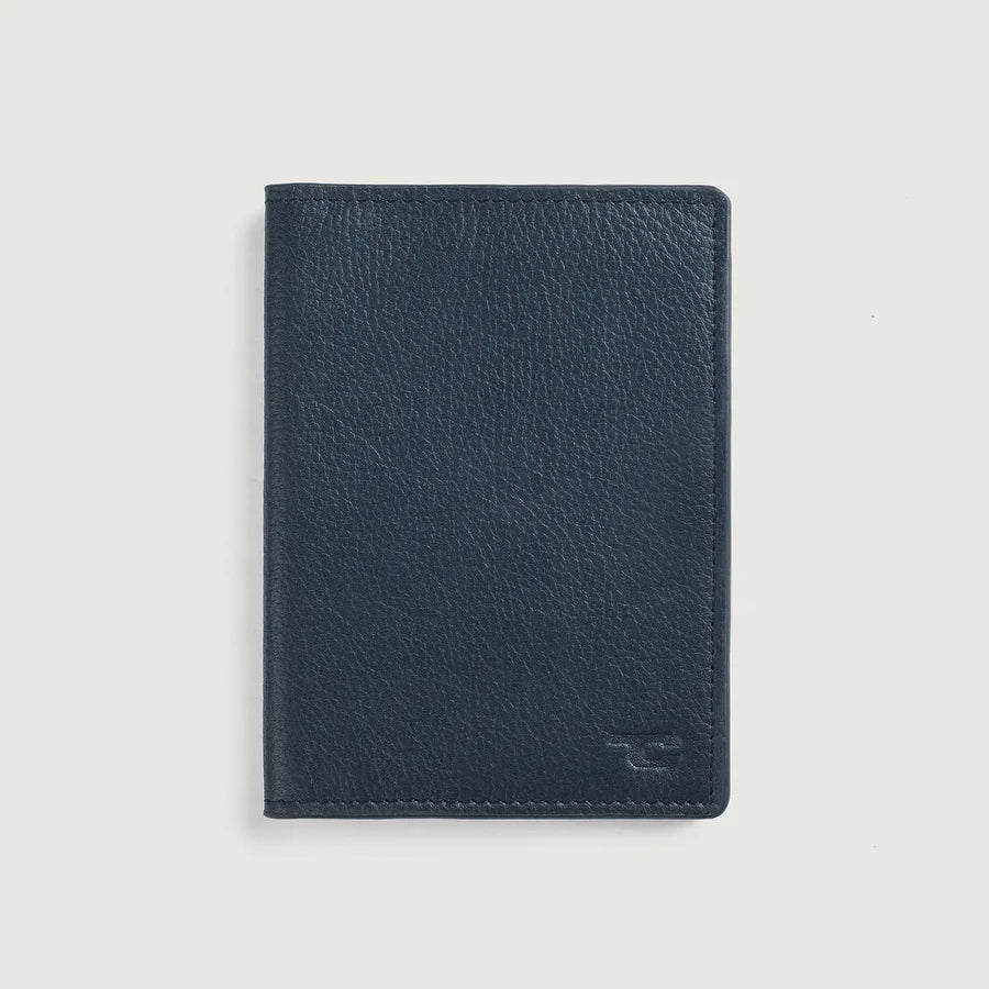Close-up of premium genuine blue leather texture and fine stitching