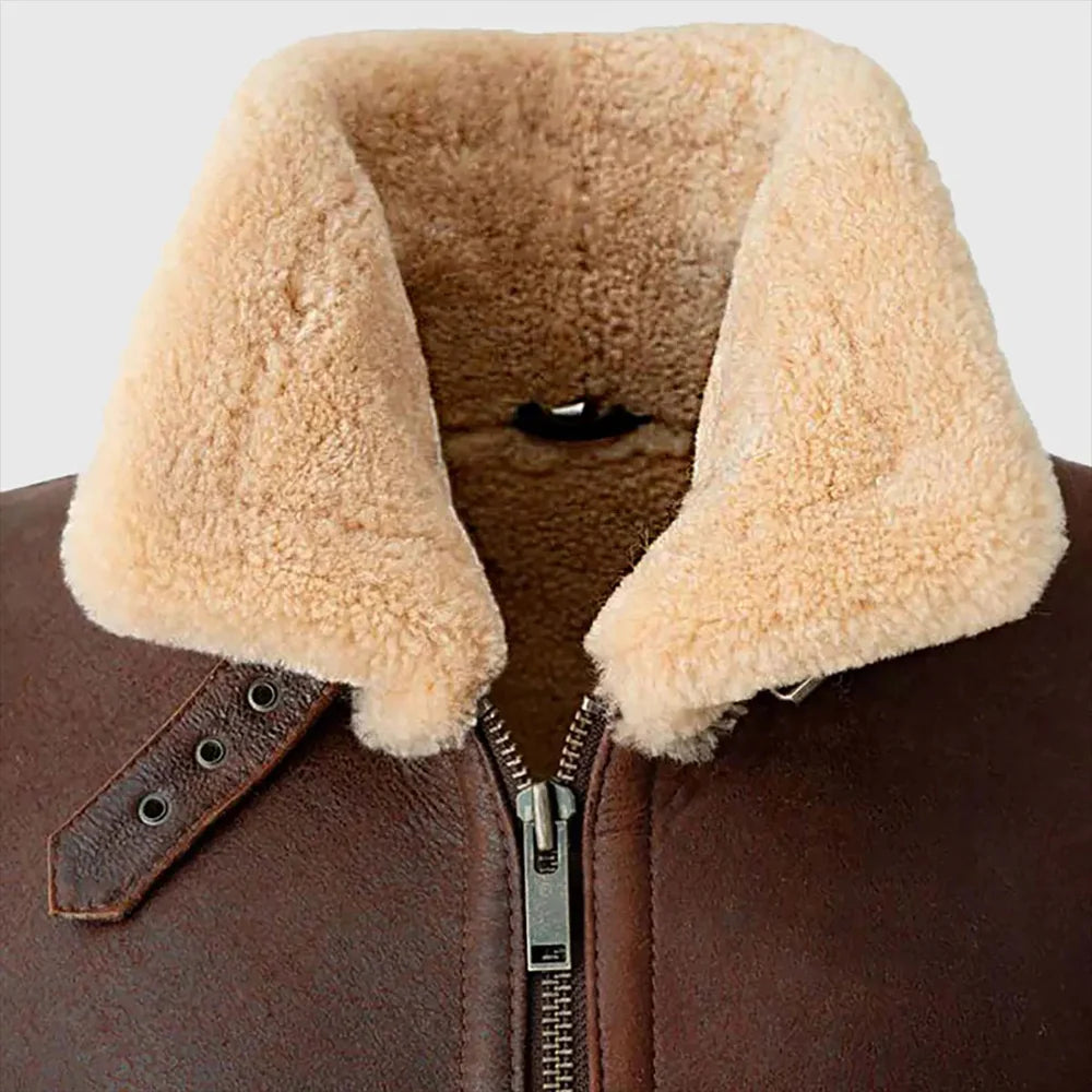 Close-up of genuine shearling collar on men's brown cowhide leather jacket