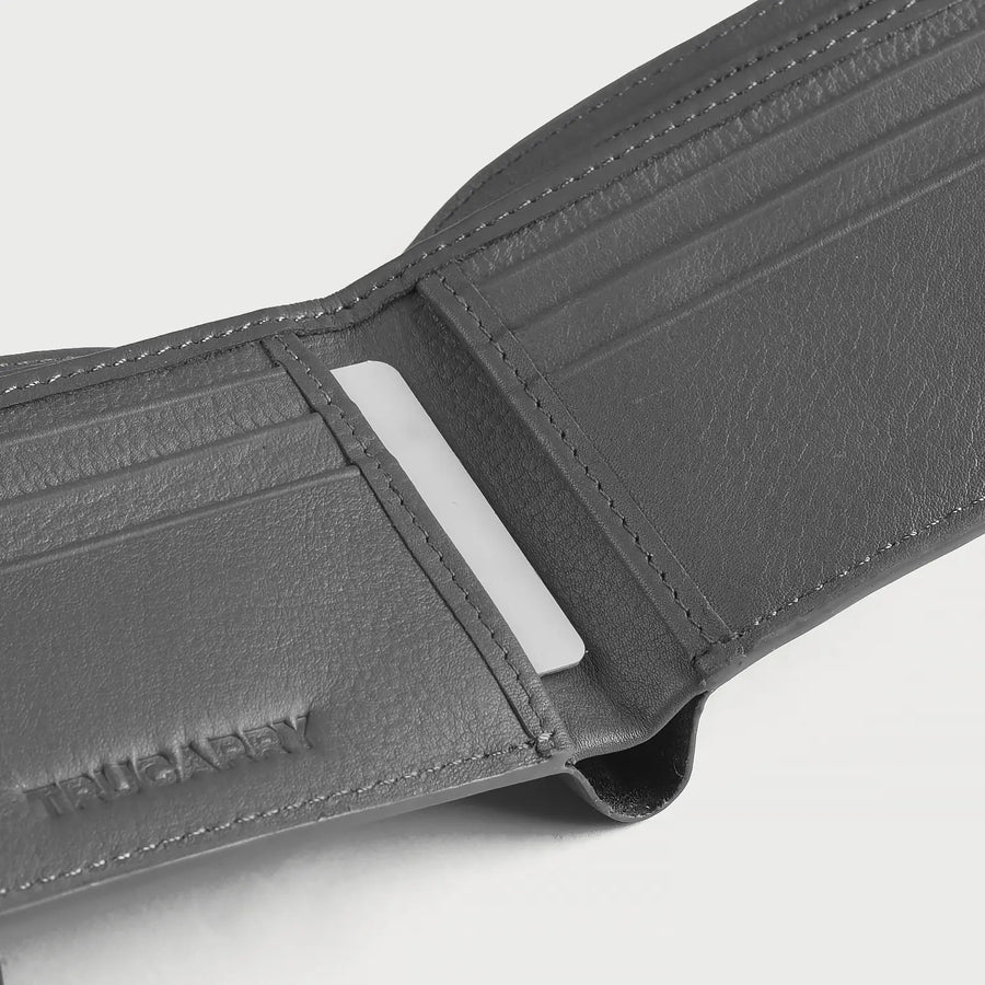 Interior of men's grey genuine leather wallet showing cash and card compartments
