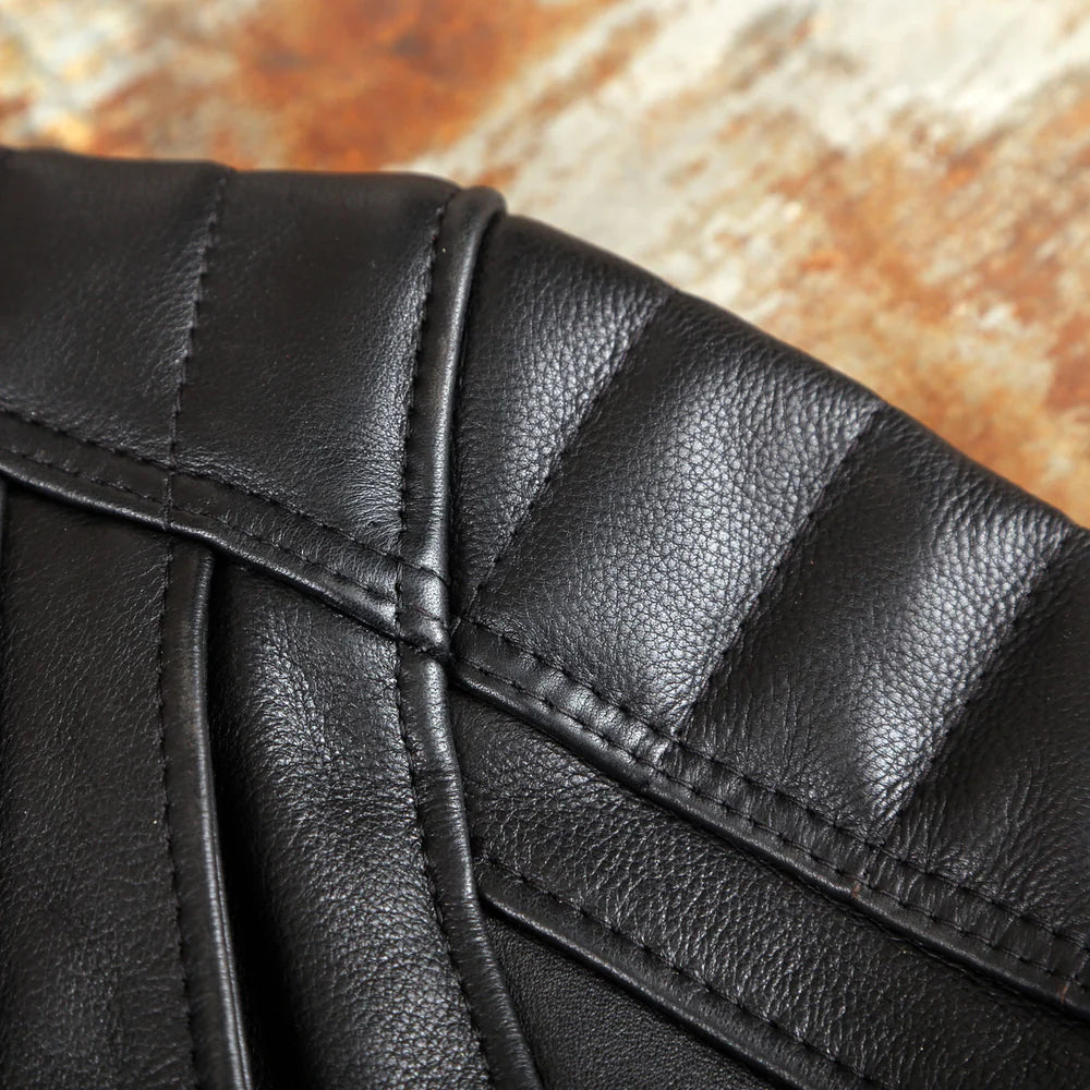Close-up of ventilation system, quilted shoulders, and YKK hardware