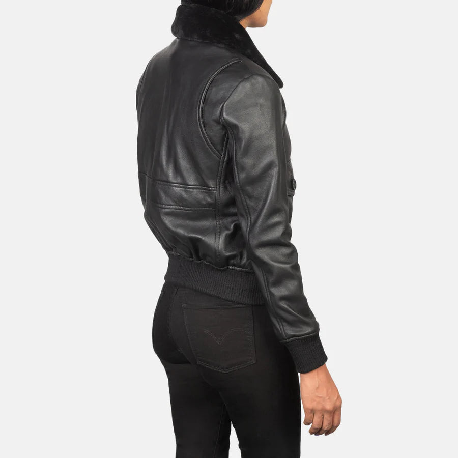 Back view of women's black leather shearling bomber jacket