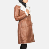 Side profile of women's brown double breasted leather shearling coat