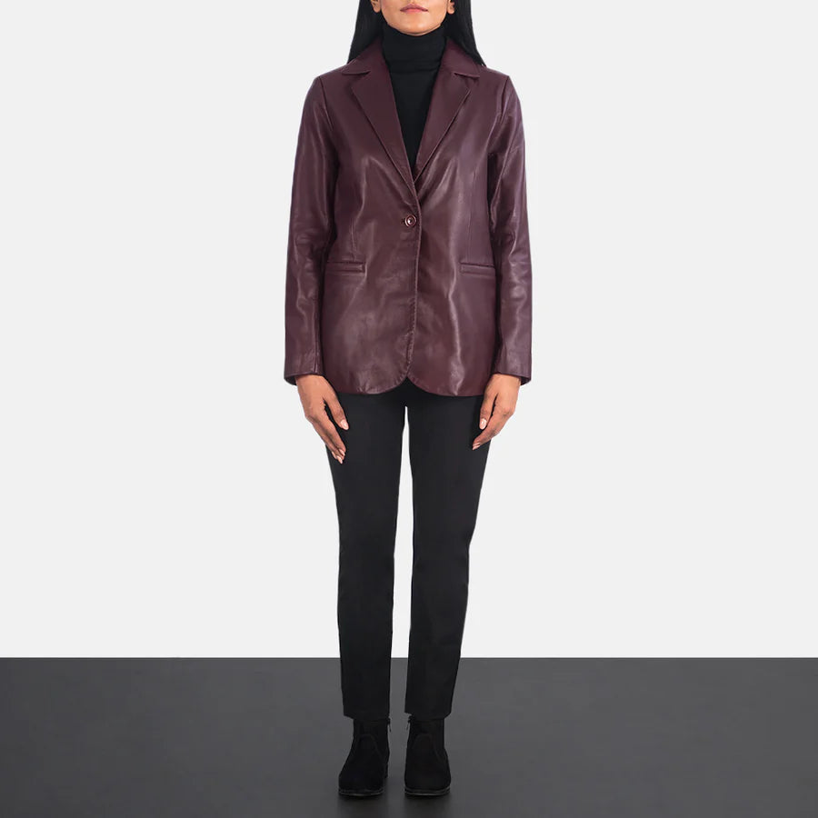 Side profile of women's tailored maroon leather blazer